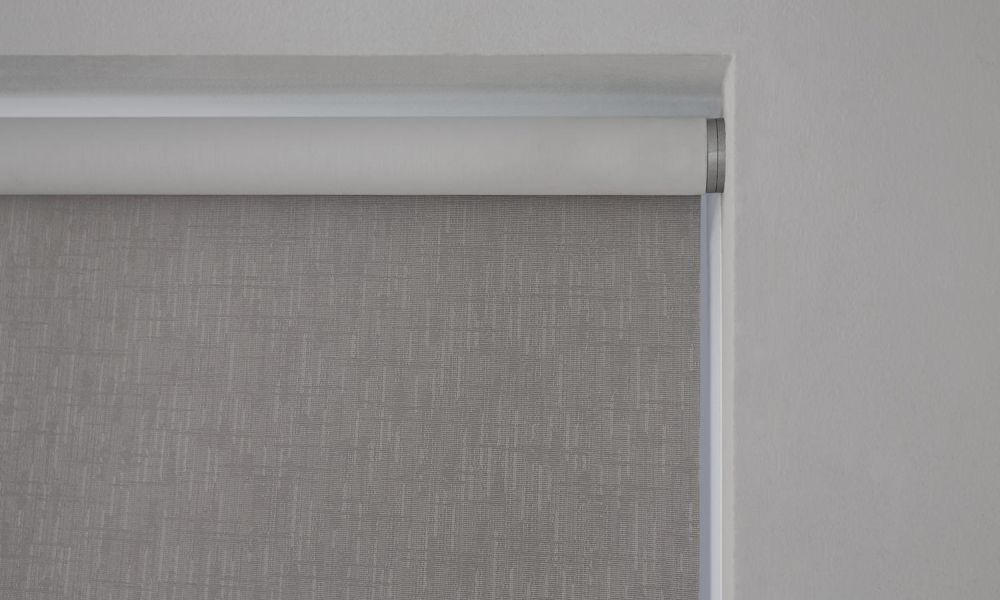 Blue frame with fabric Lutron Palladiom roller shades